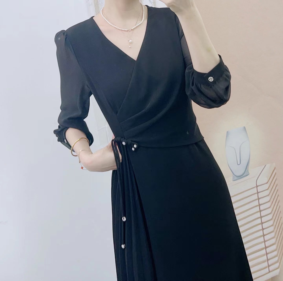 Dame vikkjole med elegante volanger og smagfulde knapdetaljer Stilla
