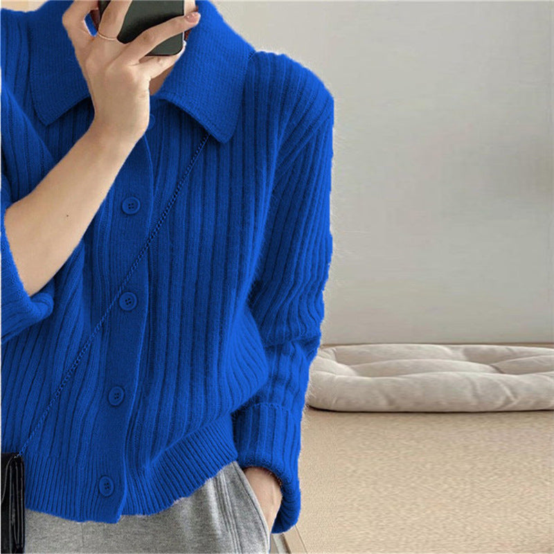 Dame cardigan med elegant knaplukning og ultramoderne ribbet design Stilla