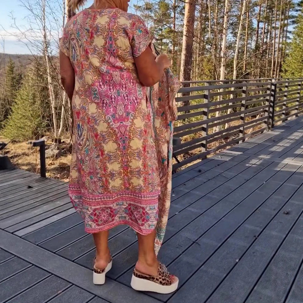 Dame nan flydende midikjole i tunika-kaftan-mix med V-udskæring, korte ærmer, løstsiddende pasform og matchende pareo Skovae