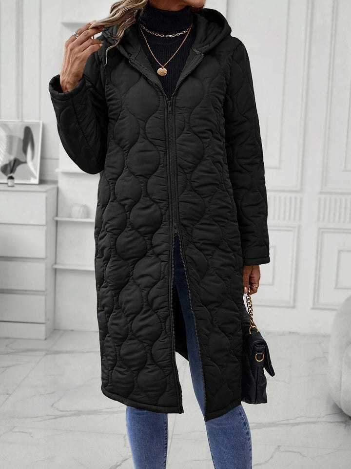 Dame hættejakke med elegant quilting og lange ærmer Stilla