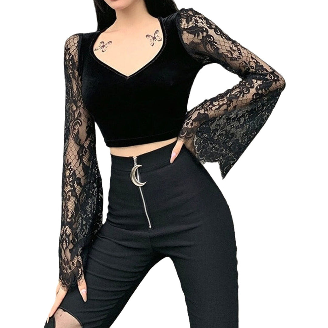Dame crop-top med elegante spidse ærmer og figursyet snit Skovae