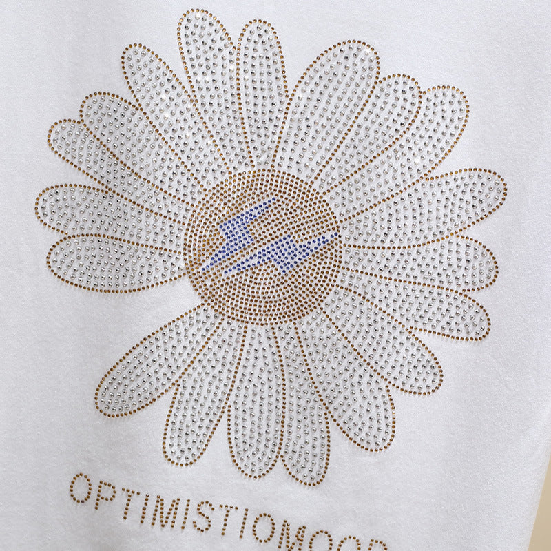 Dame T-Shirt med glitrende blomstermotiv og positiv besked Stilla