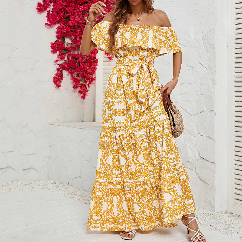 Dame maxikjole med off-shoulder design og blomster mønster detaljer Stilla