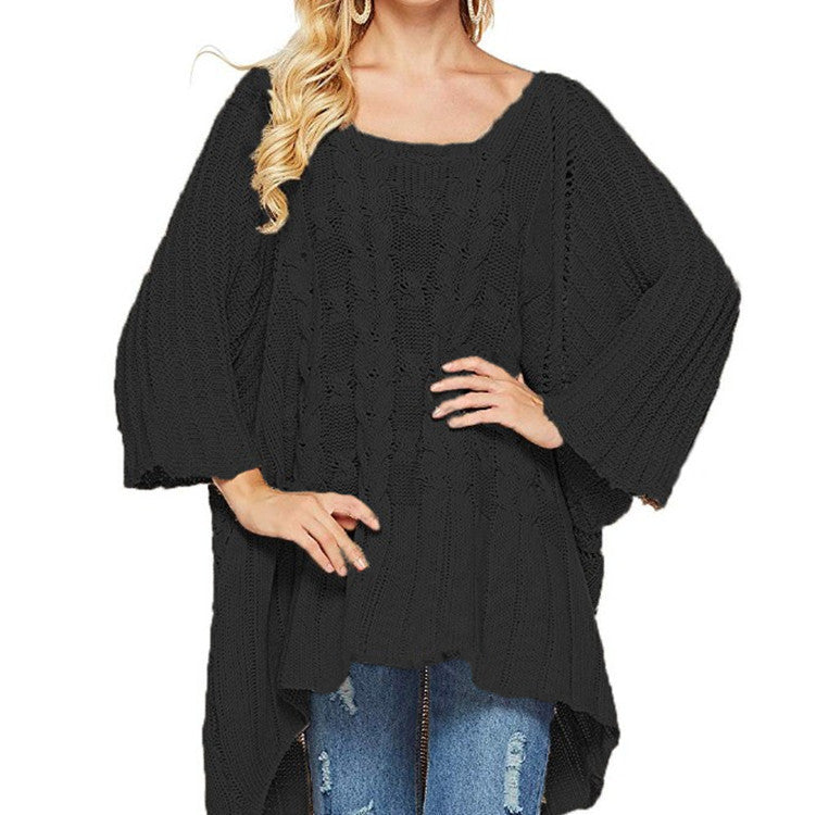 Women's chunky knit poncho with trendy cable pattern and wide sleeves Stilla