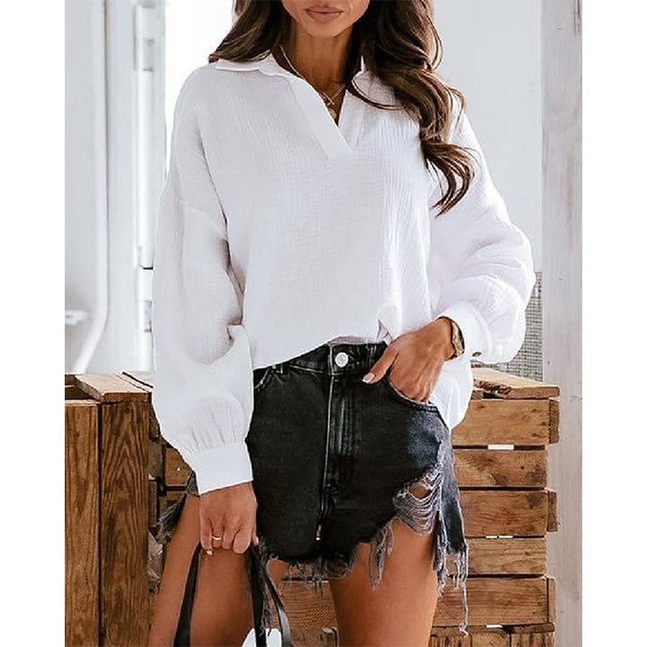 Dame Oversized Bluse med elegant knapstolpe og afslappet snit Stilla
