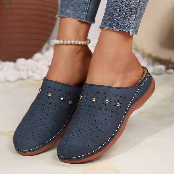 Dame Komfortable Clogs med fashionable perforeringsdesign og dekorative accenter Stilla