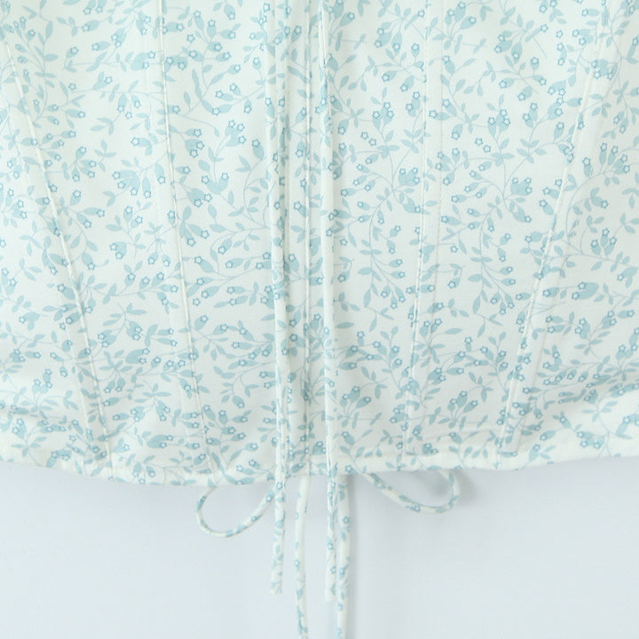 Dame blusenshirt med delikat blomsterprint og justerbare spaghetti-stropper Stilla