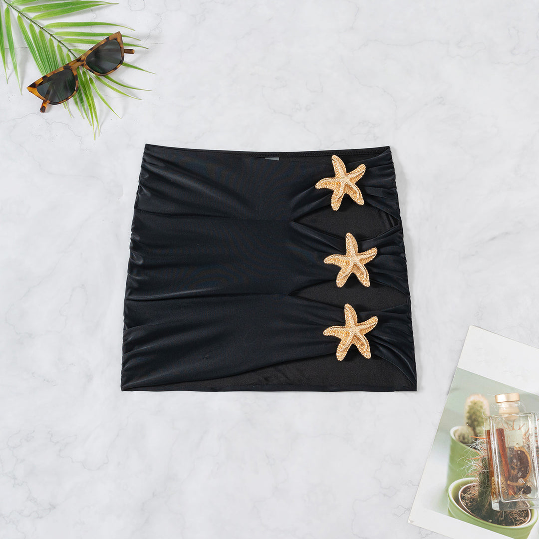 Dame Strandkjole med elegante Cut-Outs og glimrende muslingedetaljer Skovae