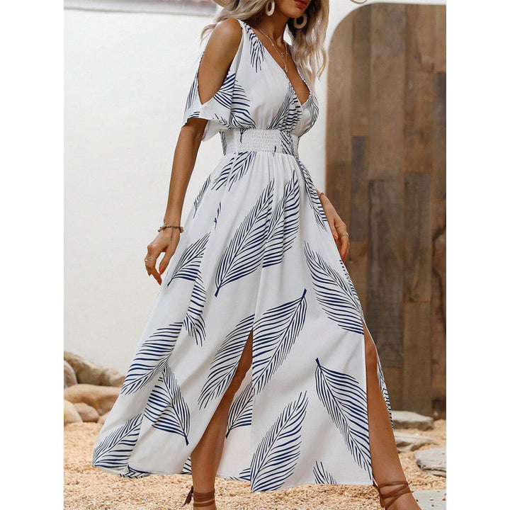 Dame maxikjole med elegant cut-out-design og flydende kant Stilla