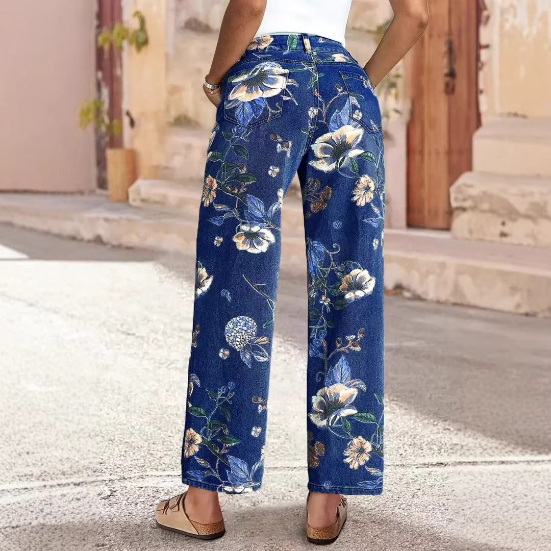 Kvindelige brede snit jeans med blomsterdesign og høj talje