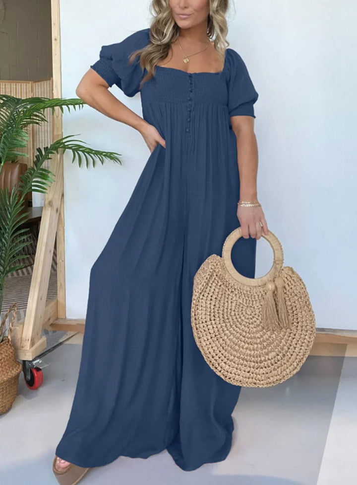Dame afslappet jumpsuit med smalle stropper og knapdetalje Stilla