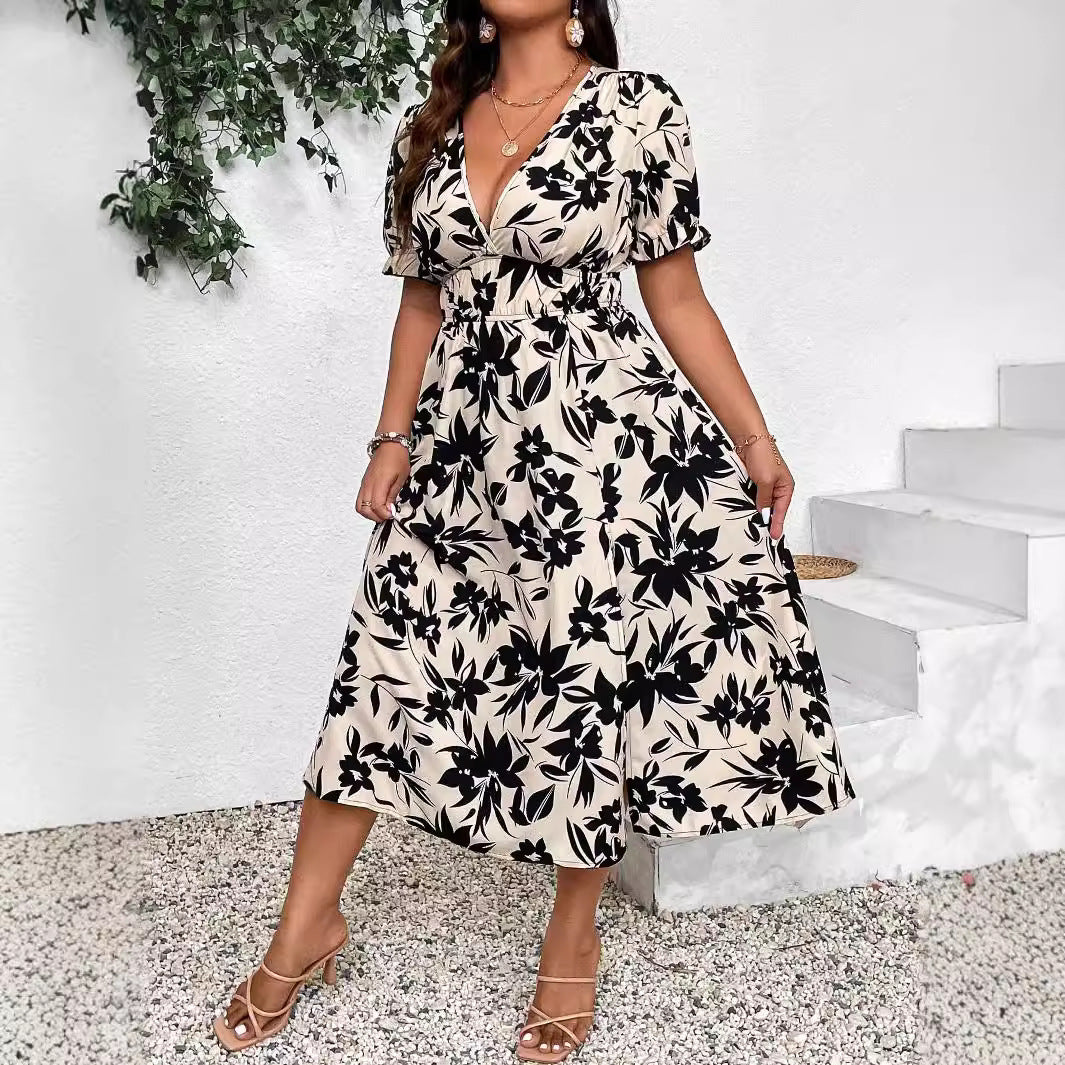 Dame Midikjole med floralt design og elastisk talje Stilla