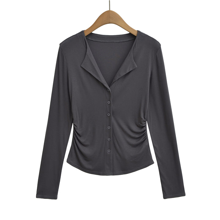 Dame figursyet top med knaplukning og moderne draperingseffekt Stilla