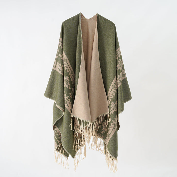 Dame Elegant Strikponcho med Kunstneriske Frynser og Blomsteragtige Accenter Skovae