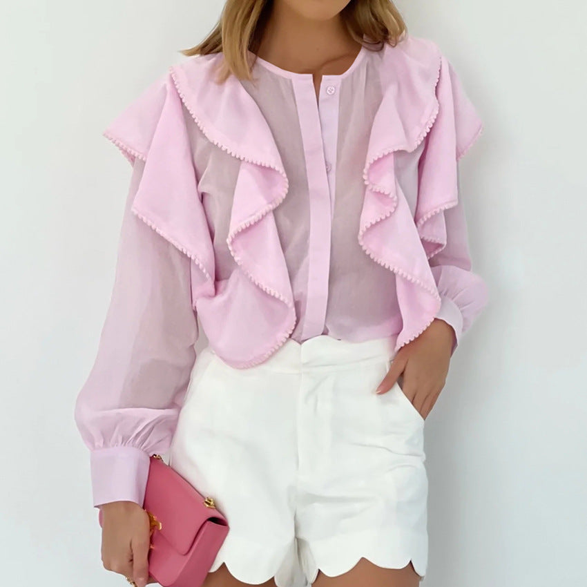 Damebluse med voluminøse flæser og elegant ståkrave Stilla