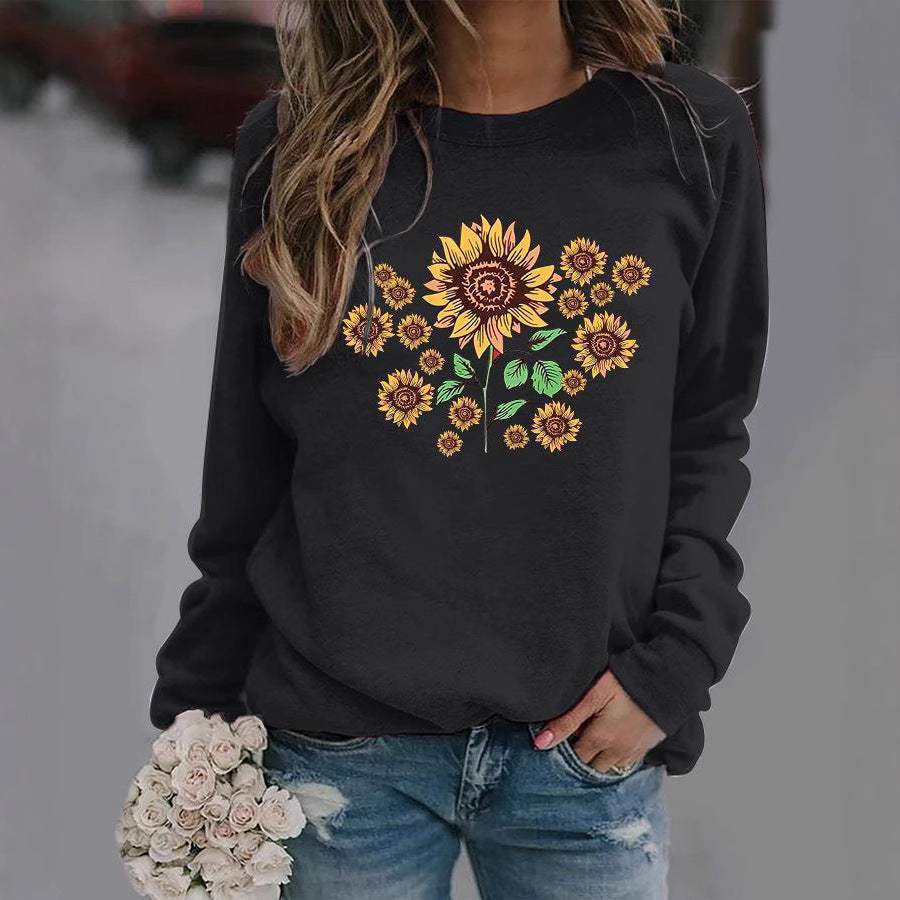 Kvinders sweatshirt med florale solsikke motiver og behagelig pasform Stilla
