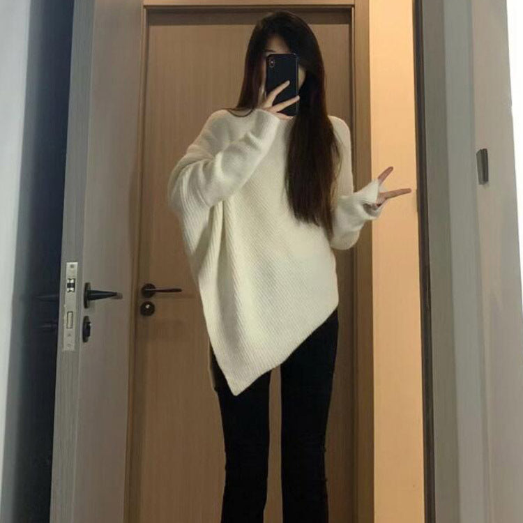 Kvinders oversized strikpullover med asymmetrisk snit og fin ribstruktur Stilla