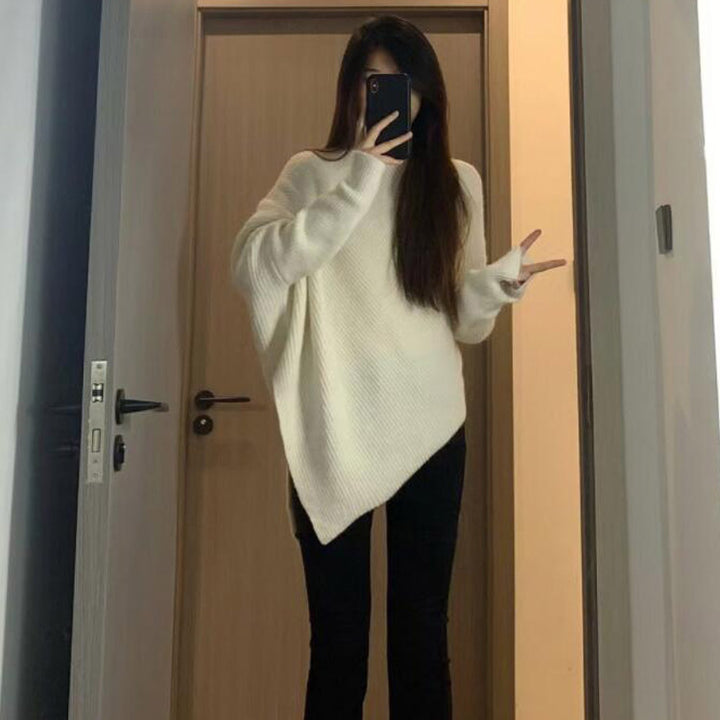 Kvinders oversized strikpullover med asymmetrisk snit og fin ribstruktur Stilla