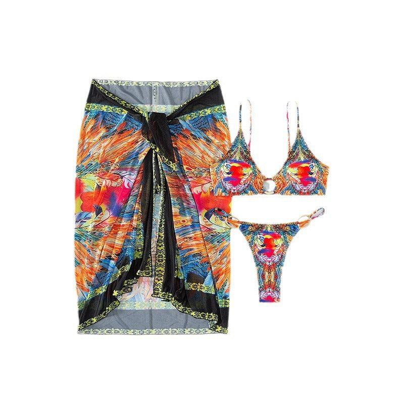 Dame bikini sæt med elegant indpakningsskørt og moderigtigt ringdetalje Skovae