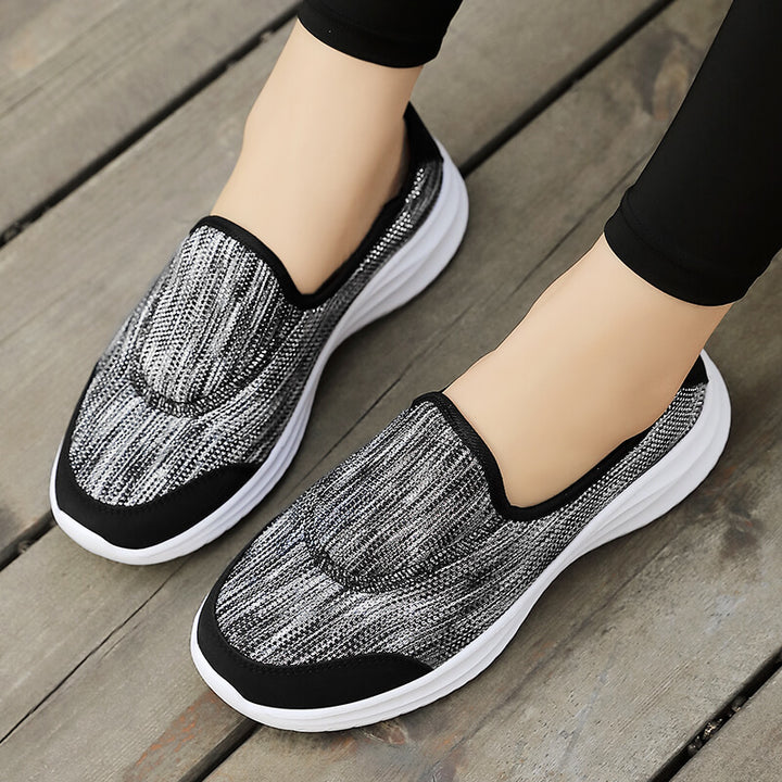 Dame nan elegant slip-on sneakers med elastiske dekorbånd, åndbar strikkonstruktion og dæmpet komfortsål Skovae