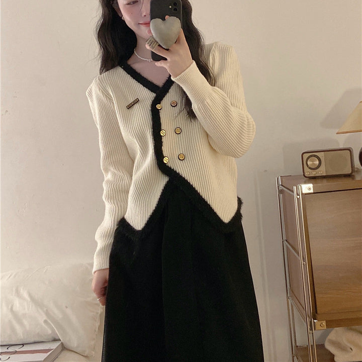 Kvindernes elegante cardigan med kontrastkant og knapdetaljer Stilla