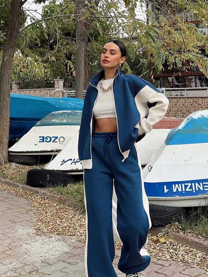 Kvinders moderne sports- og fritidssæt med cropped jakke og brede bukser Skovae