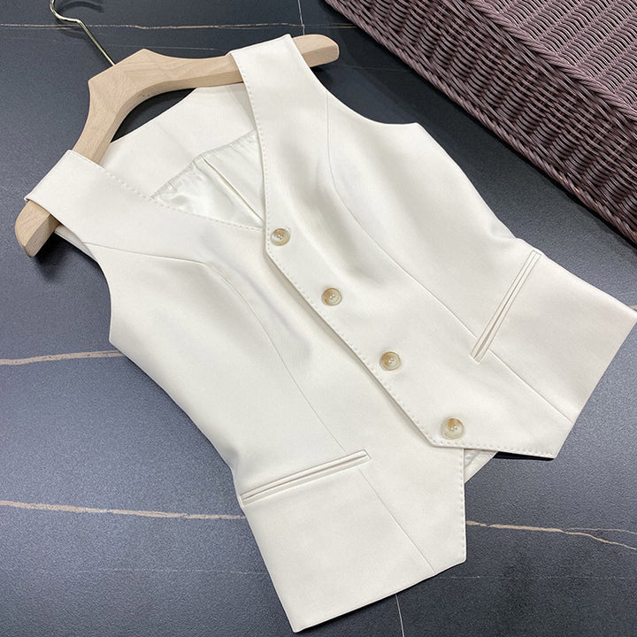 Dame elegant vest med fine guldknapdetaljer Stilla