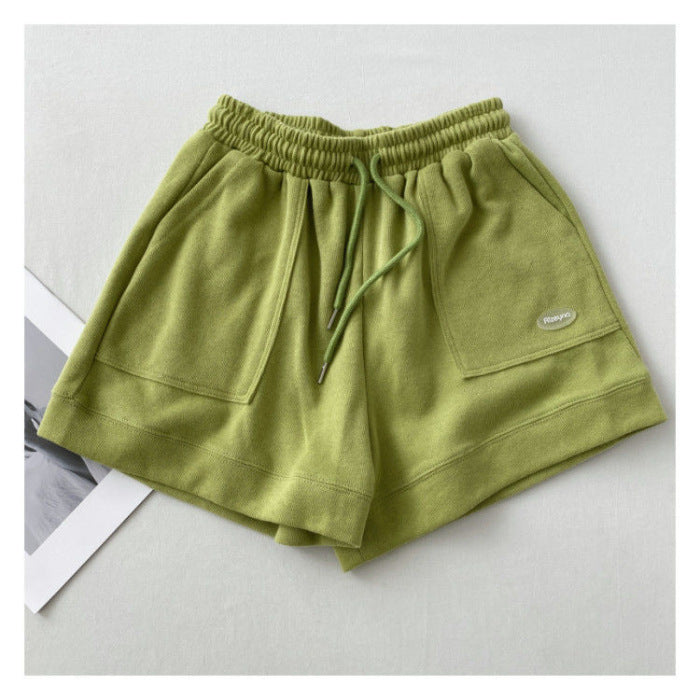 Kvindernes afslappede joggingshorts med elastisk talje og praktiske sidelommer