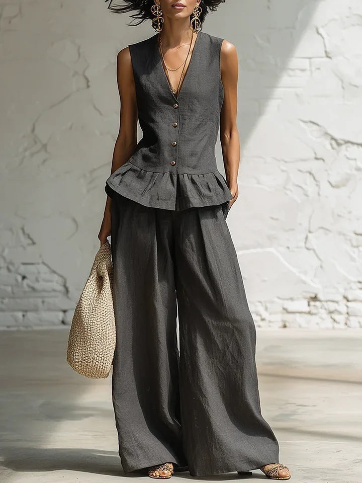Dame casual jumpsuit med peplum skæring og knapdetaljer Skovae