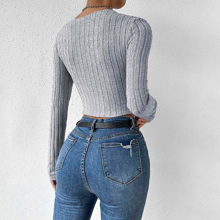 Kvindernes cropped top med tidløst twist-design og lange ærmer Stilla
