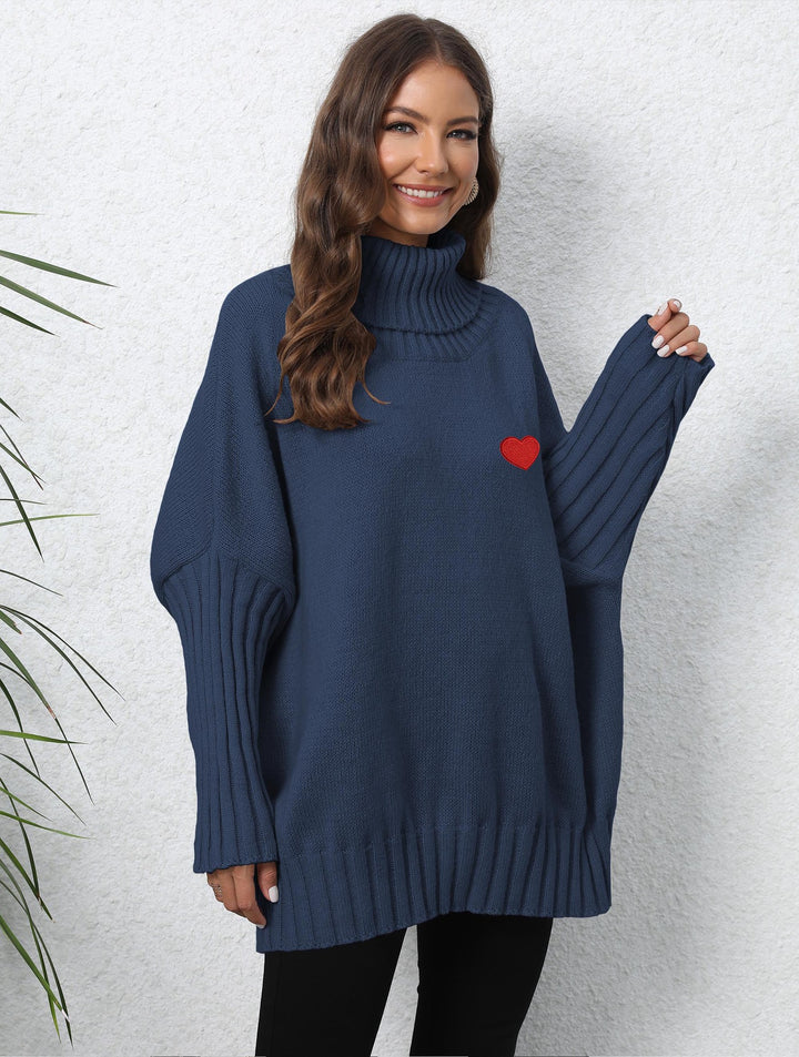 Dame Oversized Turtleneck Sweater med hjerteformet applikation og strikket mønster Stilla