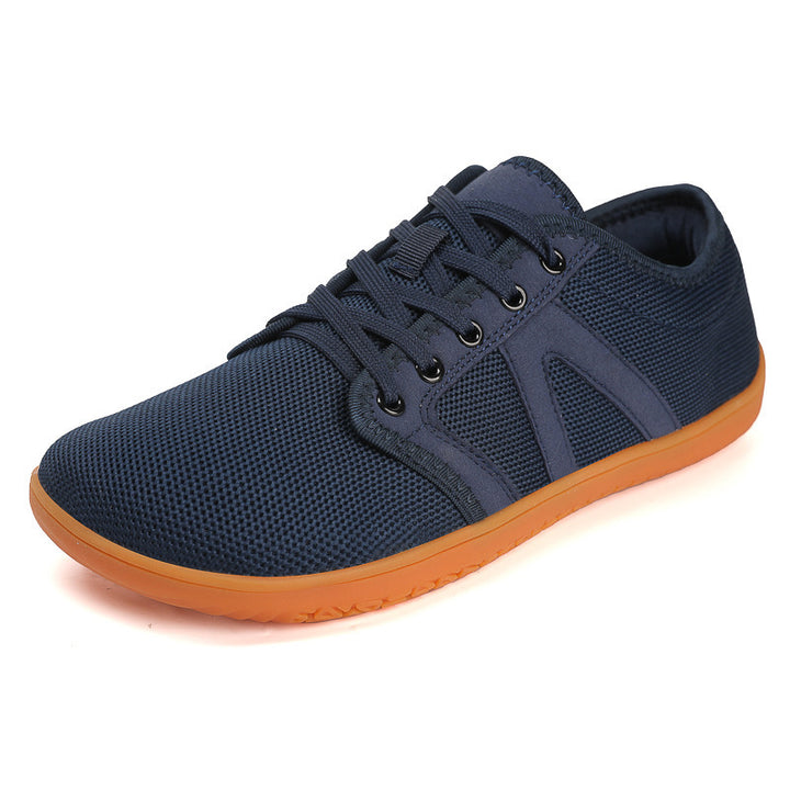 Unisex nan minimalistiske City sneakers med fint masket tekstiloverdel, polstret indgang og fleksibel gummisål Skovae