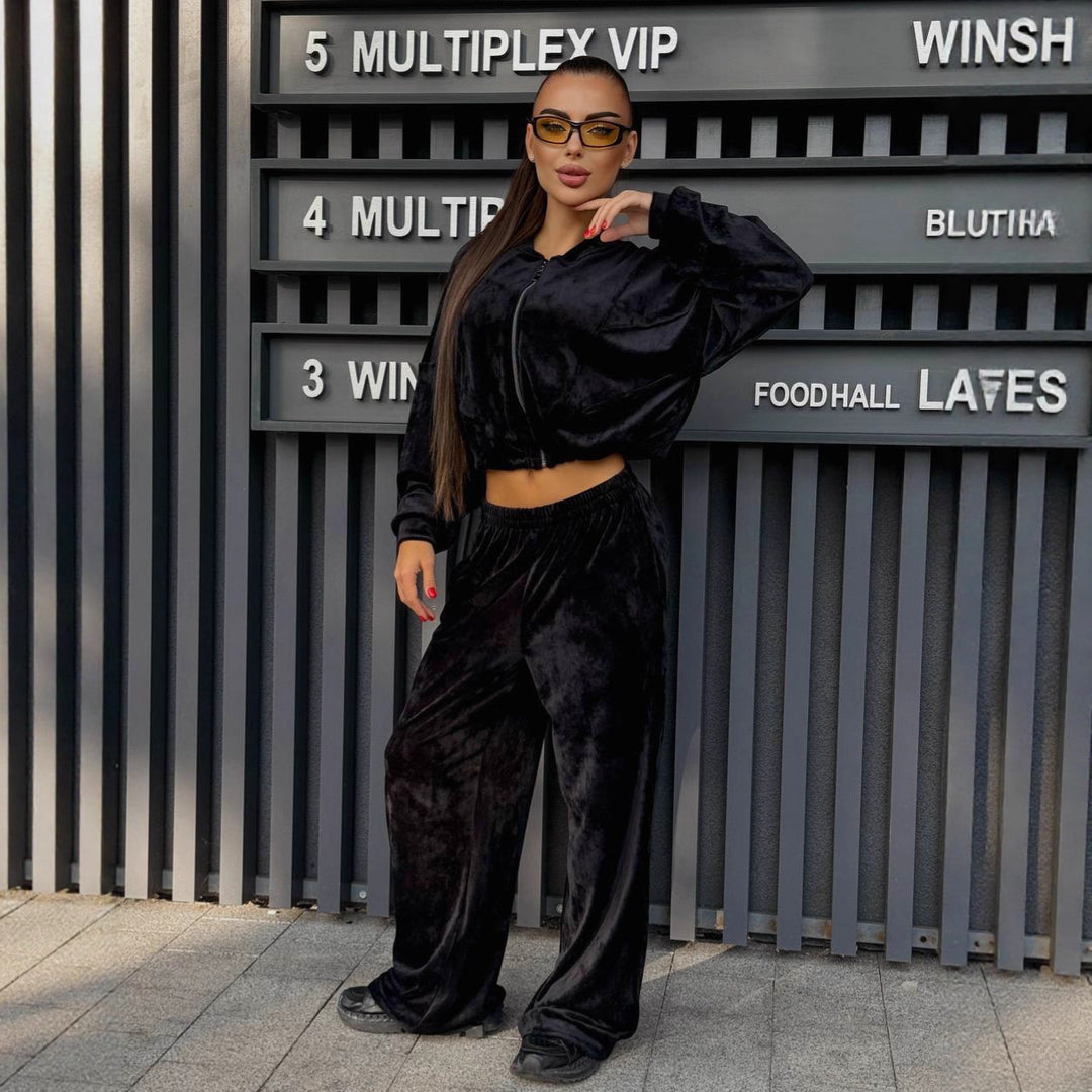 Kvindernes sporty loungewear jakke med lynlås og trendy bredskårne bukser Skovae