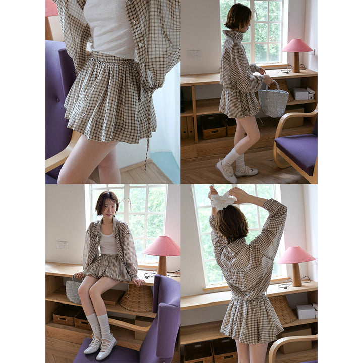 Dame mini nederdel i elegant ternet design med elastisk talje og feminin volant Stilla