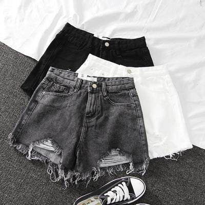 Kvinders ødelagte denimshorts med høj talje og frynset kant