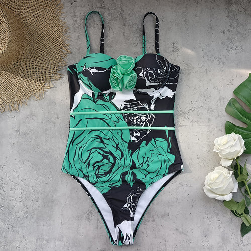 Dame badedragt med blomstret design og raffinerede stropdetaljer Stilla