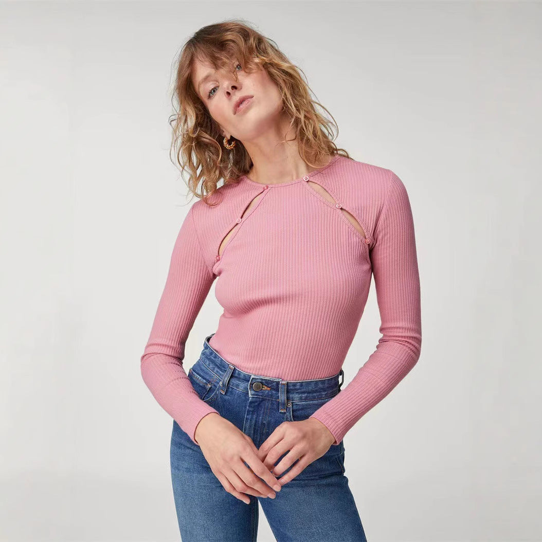 Dameoverdel med innovative cut-out-detaljer og fin ribstruktur Stilla