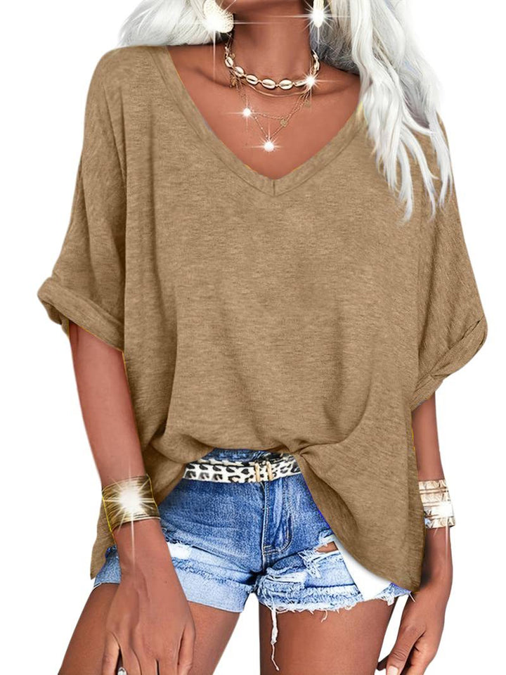 Dame afslappet V-hals T-shirt med oversized snit og plisseret detalje Stilla