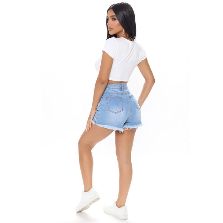 Dame Jeans-Shorts i kreativ patchwork-design med frynset kanter Stilla