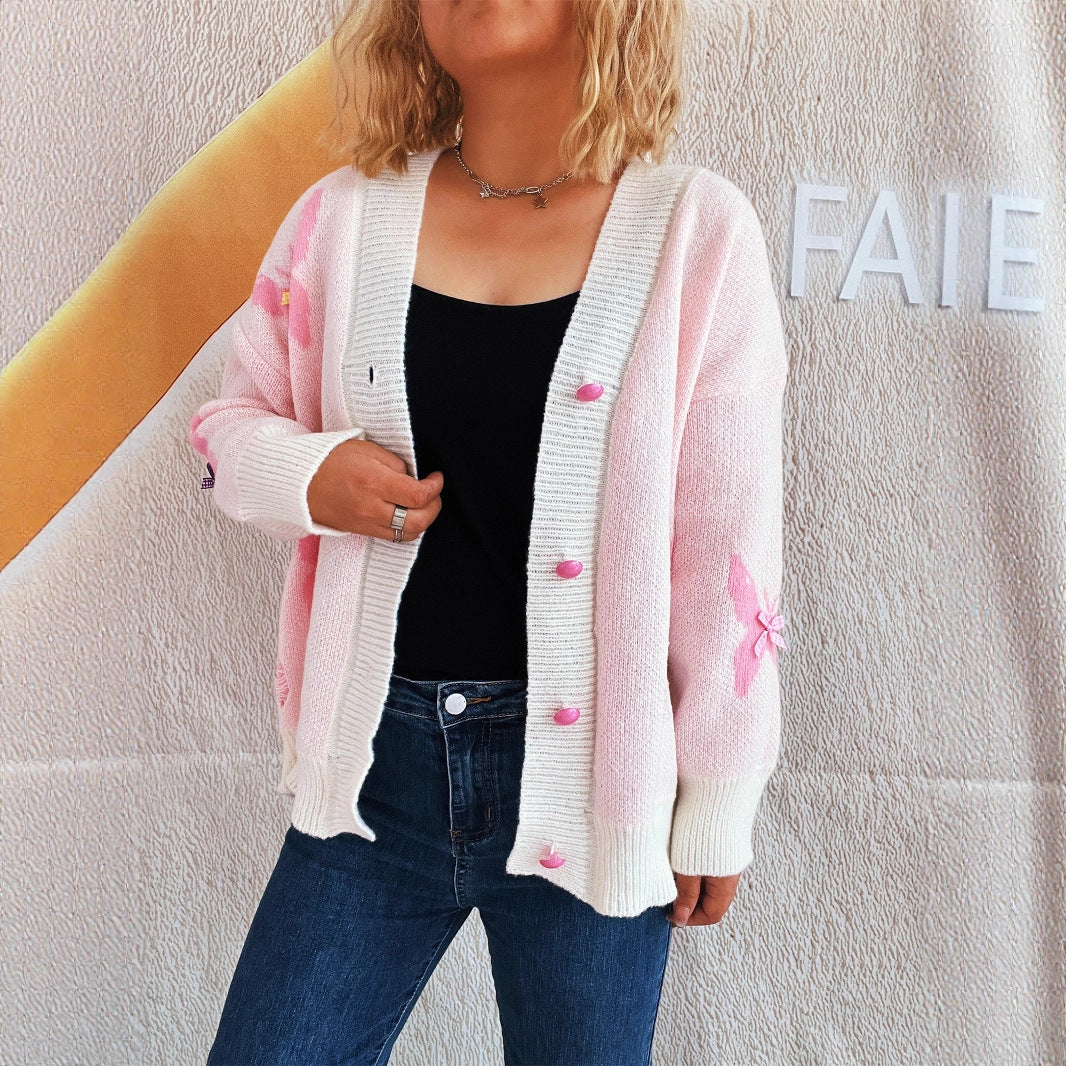 Damer hyggelig cardigan med farverigt sommerfugledesign og knapliste Stilla