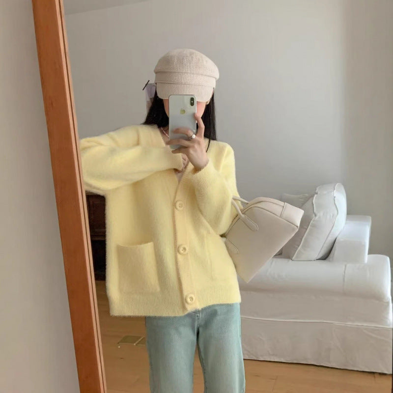 Kvinders fluffy knap cardigan med elegante lommer Stilla