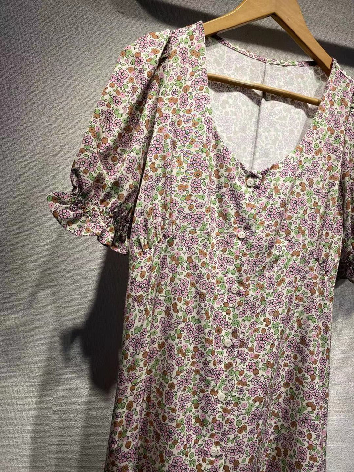 Dame Midikjole med legende blomsterprint og voluminøse ærmer Stilla
