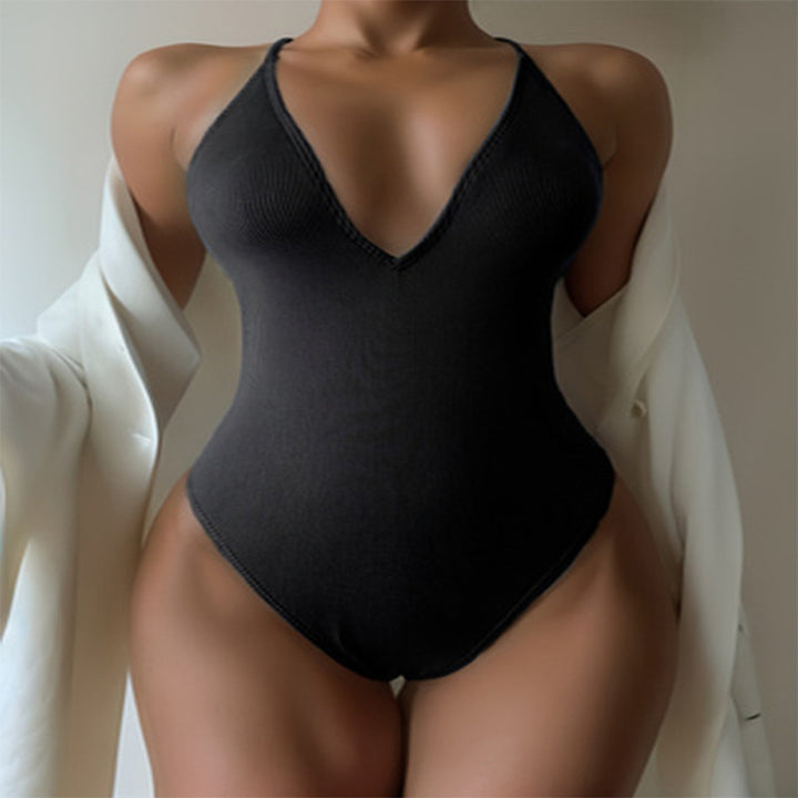 Dame one-piece badedragt med dyb V-udskæring og fashionable krydsstropper Skovae