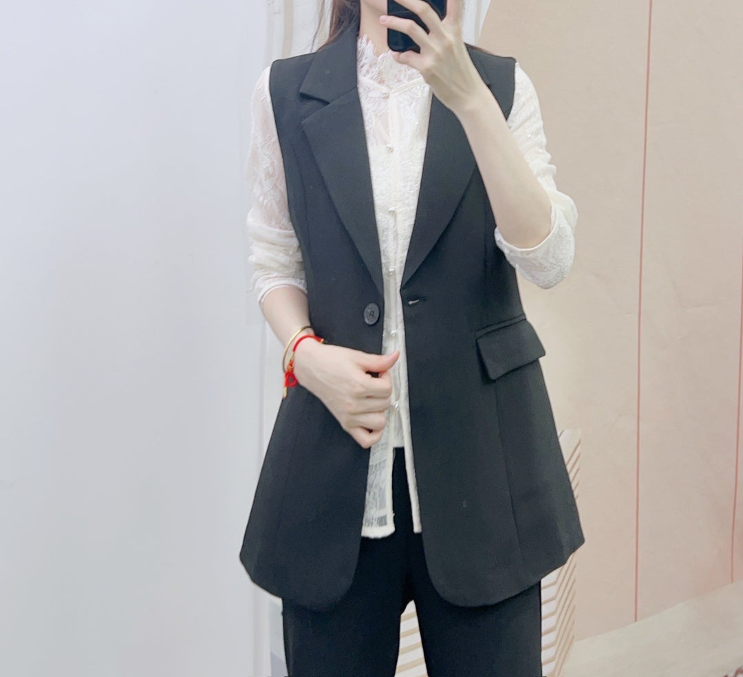 Dame elegant vest med dobbelt knapliste og struktureret design Stilla