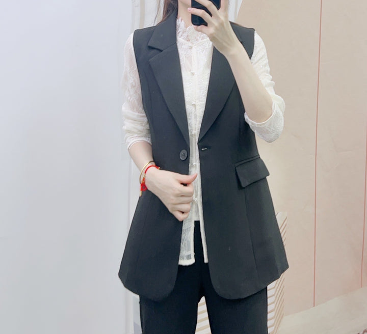 Dame elegant vest med dobbelt knapliste og struktureret design Stilla
