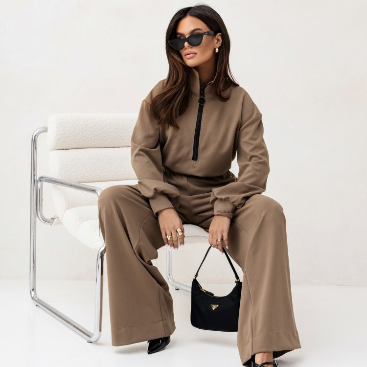 Dame sporty jumpsuit med høj krave og moderne lynlås Skovae