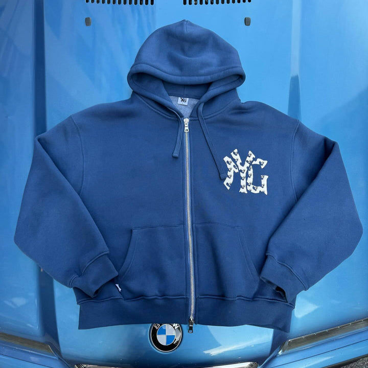 Unisex nan langt skåret hoodie sweatjakke med dobbeltsidet lynlås og logo-applikation Skovae