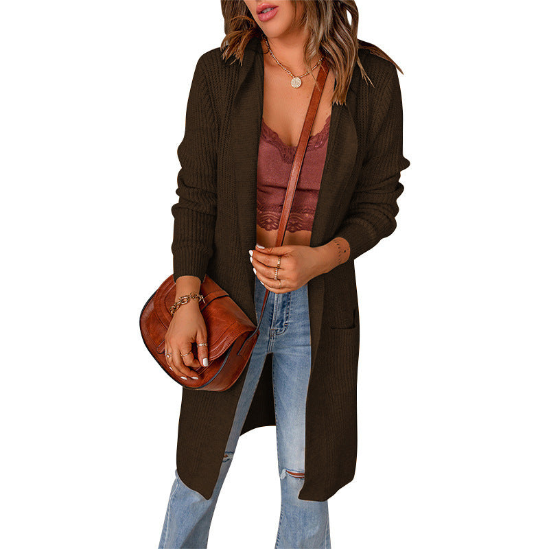 Dame strikjakke med dyb V-udskæring og praktiske lommer Stilla