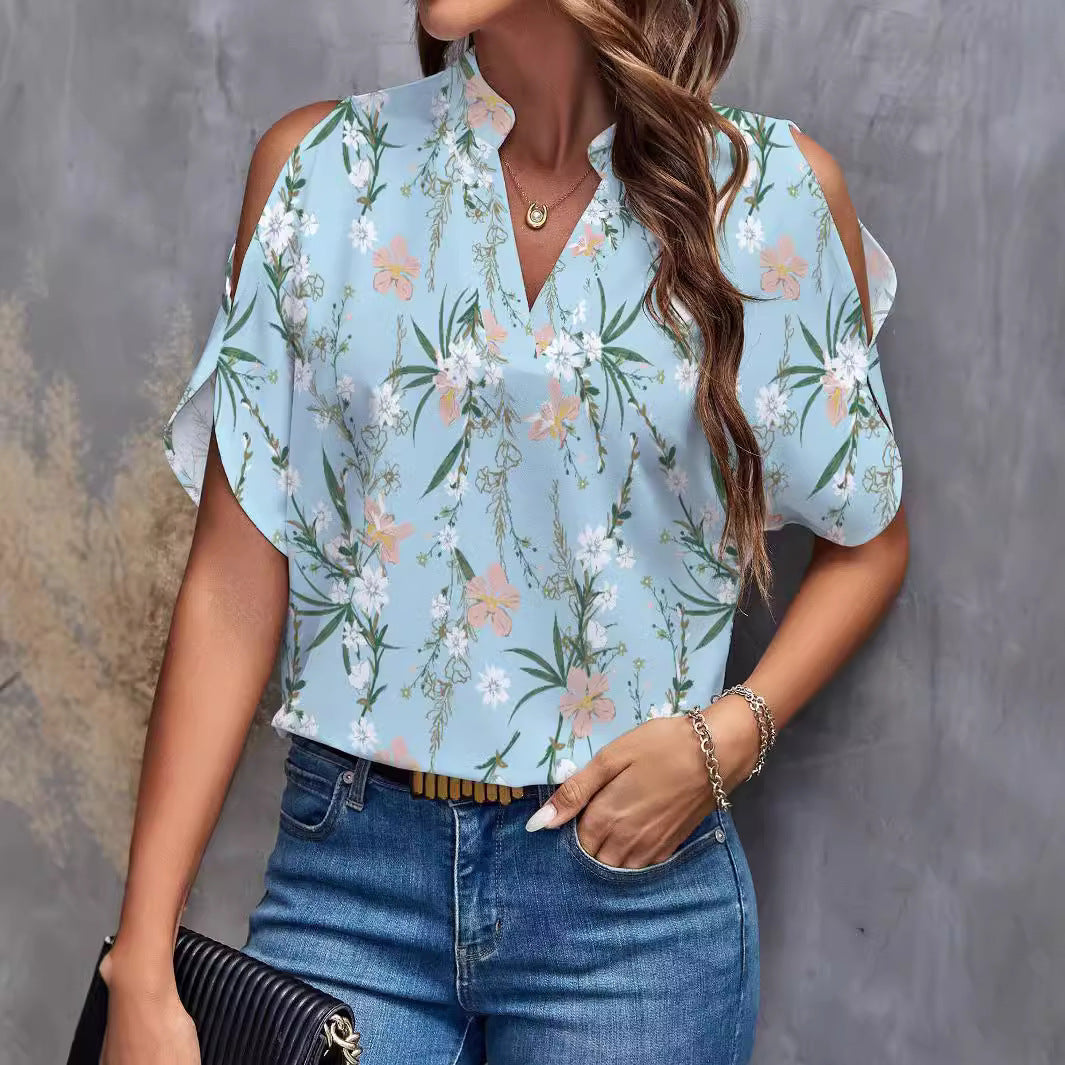 Damebluse med kold skulder og blomstertryk Stilla