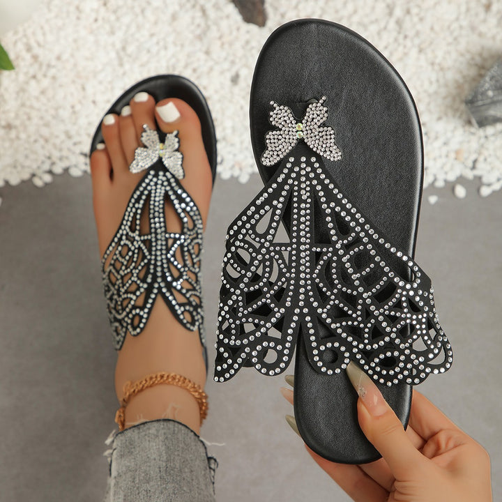 Dame Glitrende Pantoletten med filigran Sommerfugle-design og elegante Strass-applikationer Stilla